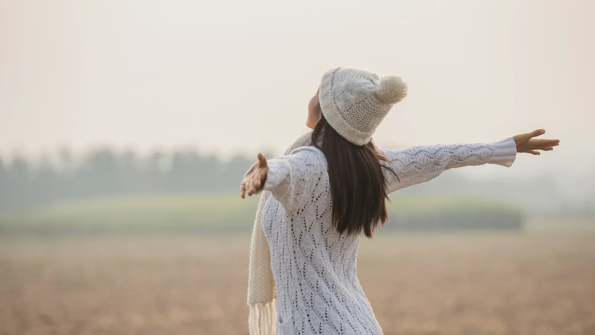 Happy Woman Enjoying Idyllic Nature Celebrating Freedom Rising Her Arms 1150 7075